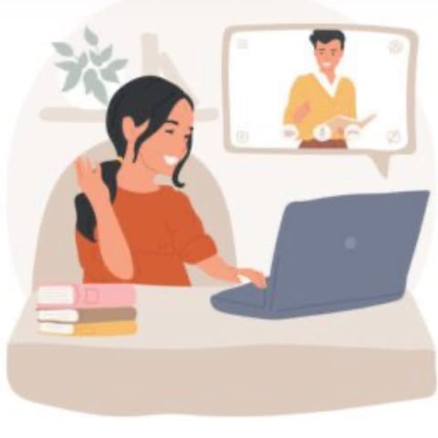 Woman on video call at desk with laptop, speaking to man in yellow shirt on screen